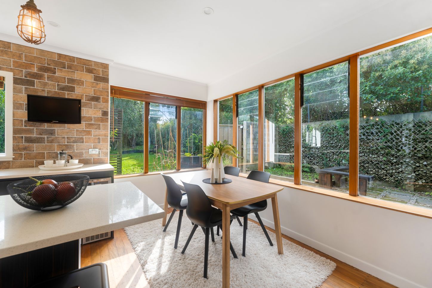 Forest Hill Road - dining with brick wall and bifolds