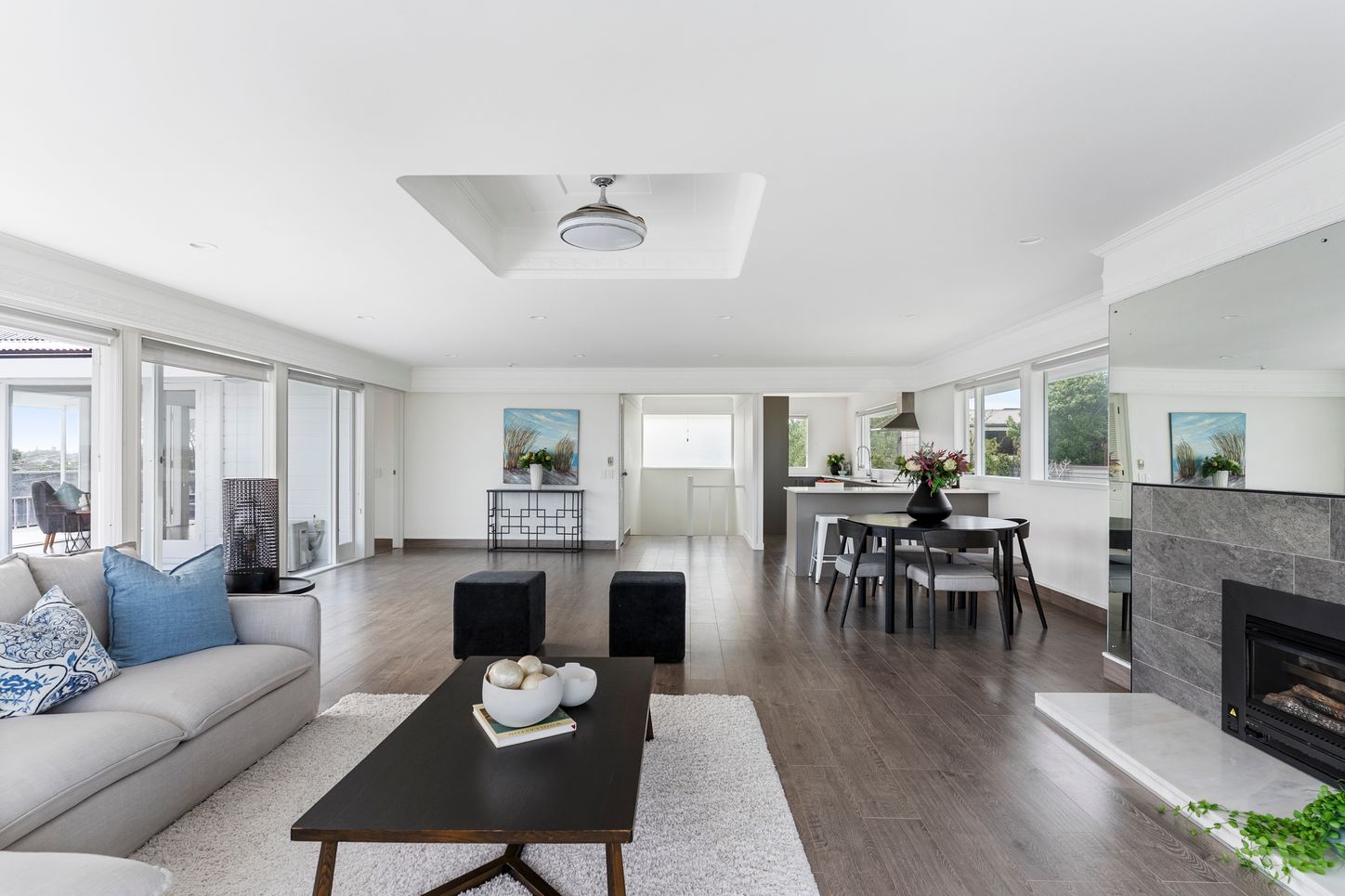 Stanley Pt Road - main home lounge with cathedral ceiling and fireplace