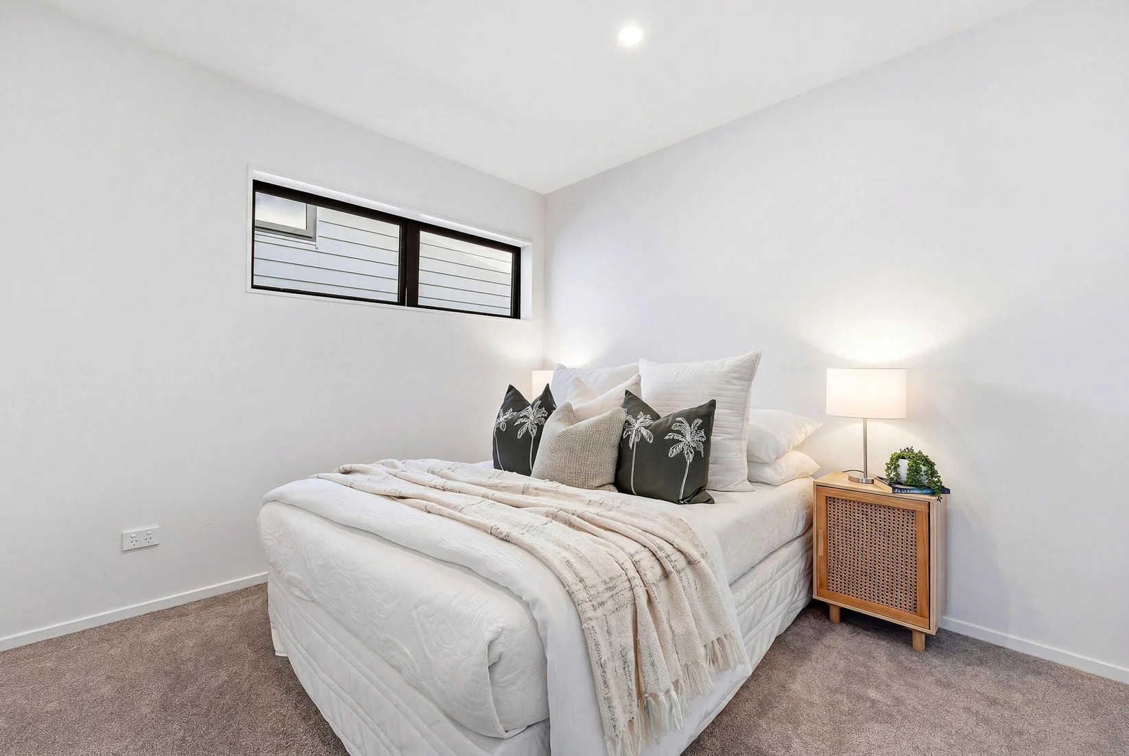 Marlborough Avenue - bedroom with grey teal cushions