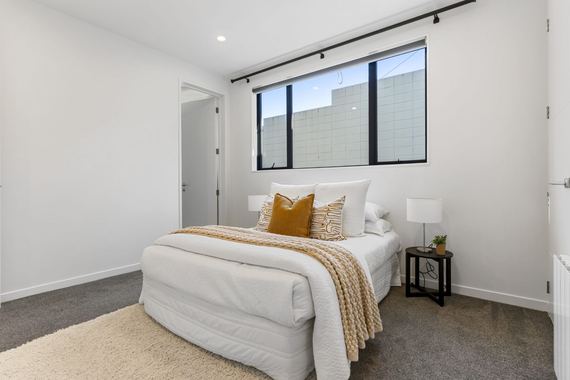 Seaview Road, Castor Bay - bedroom with mustard accents