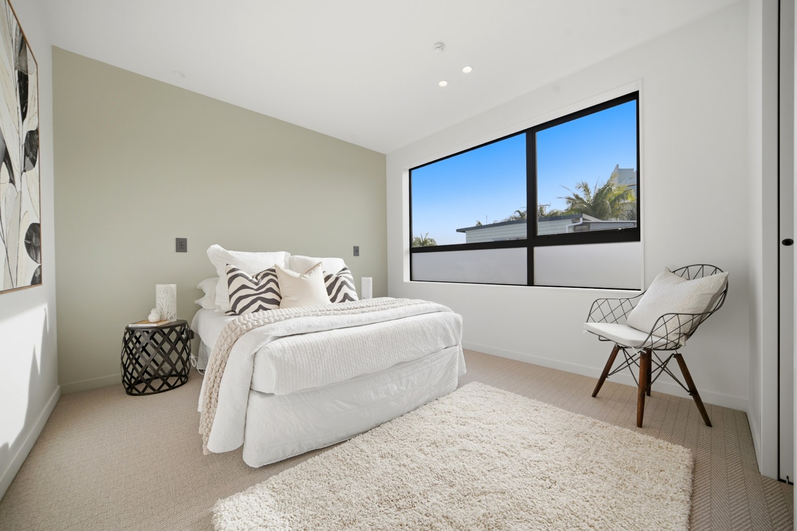 The Terrace, Takapuna - bedroom with monochrome styling and leafy outlook