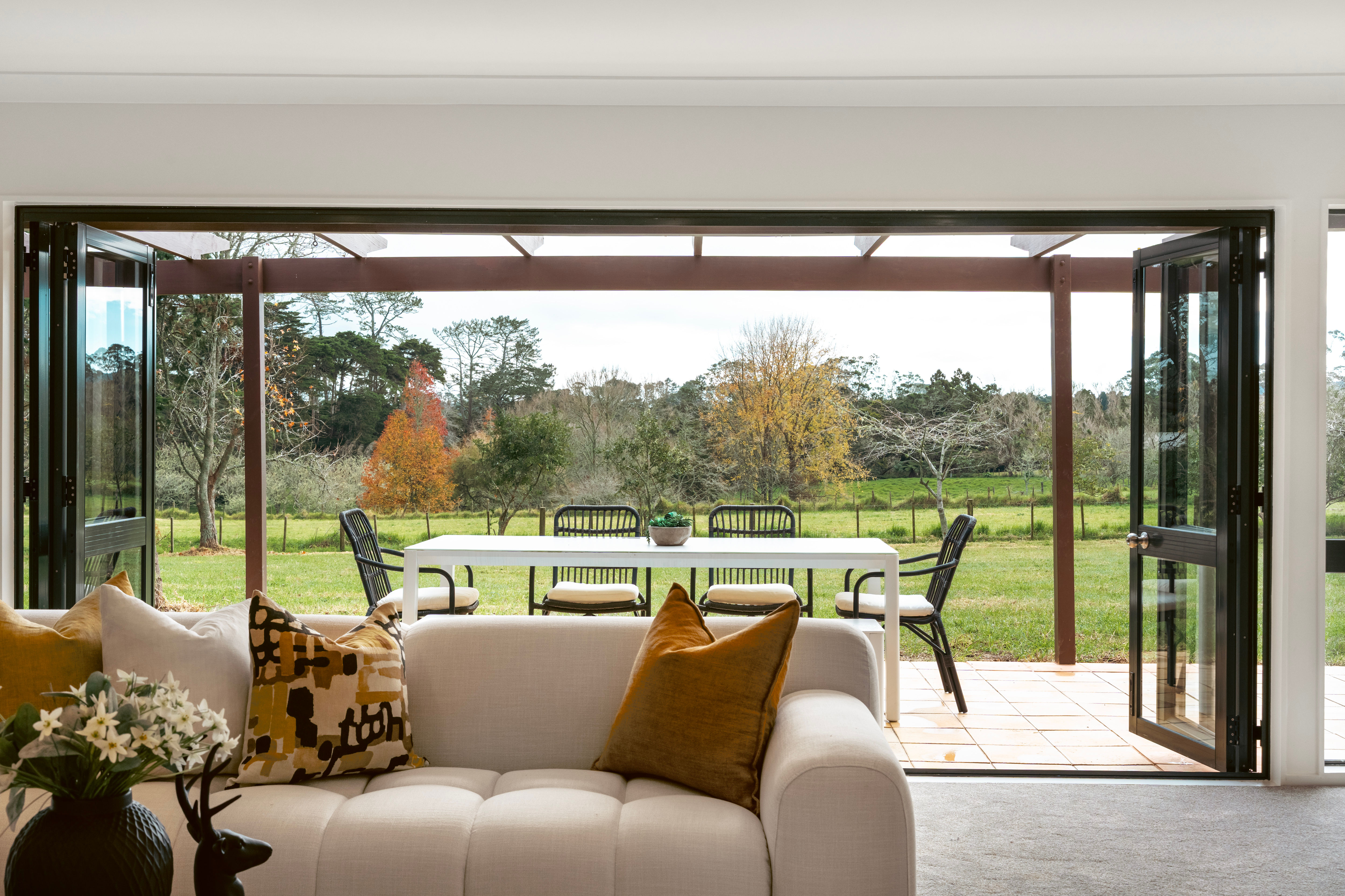 Station Road, Kumeu - living and dining opening to the deck