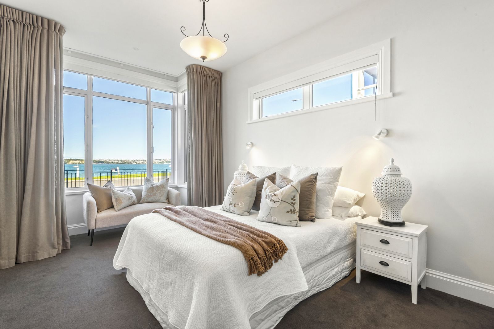King Edward Parade, Devonport - main bedroom styled with window seat and harbour views