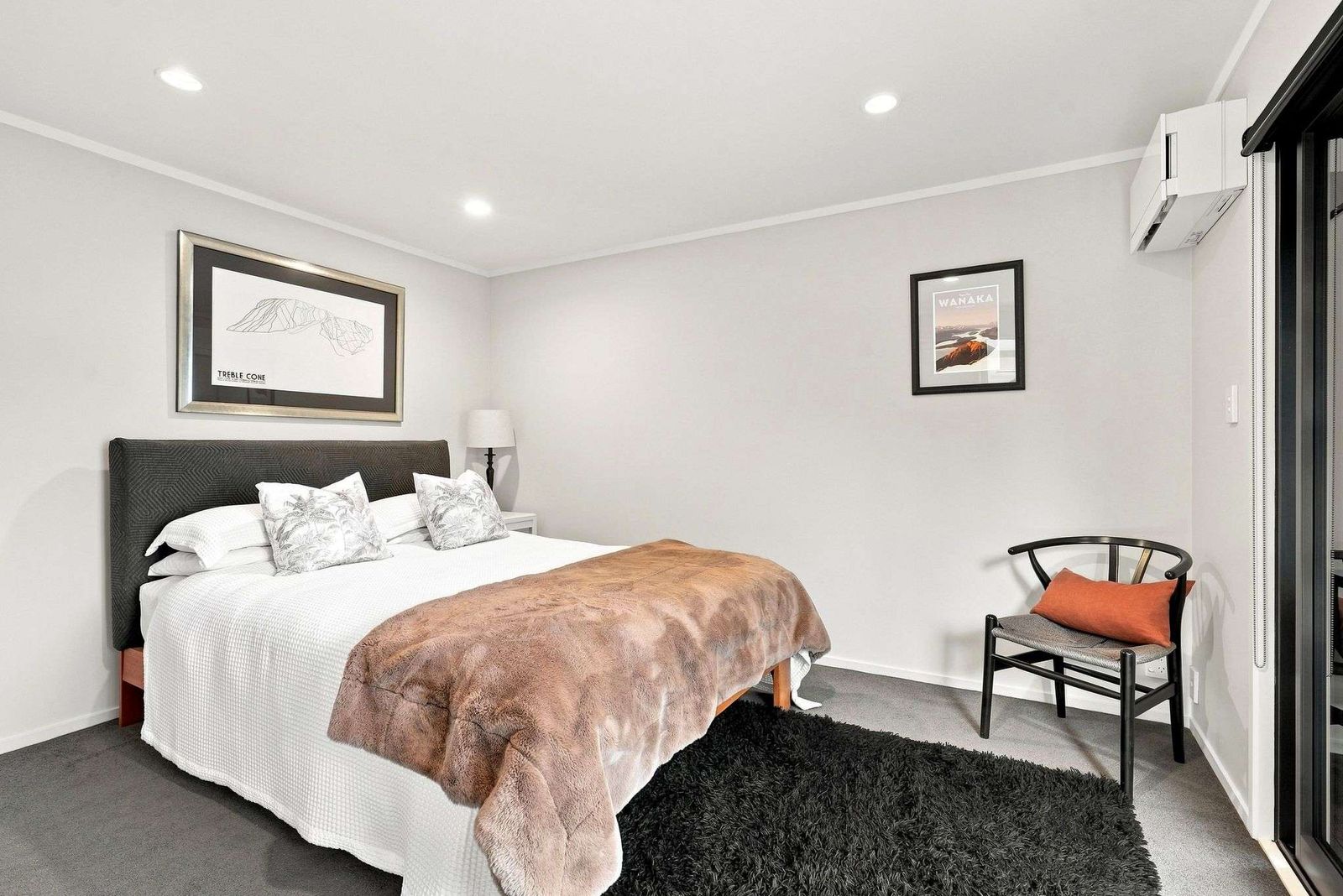 Beach Road, Campbells Bay - bedroom styled with layered neutrals