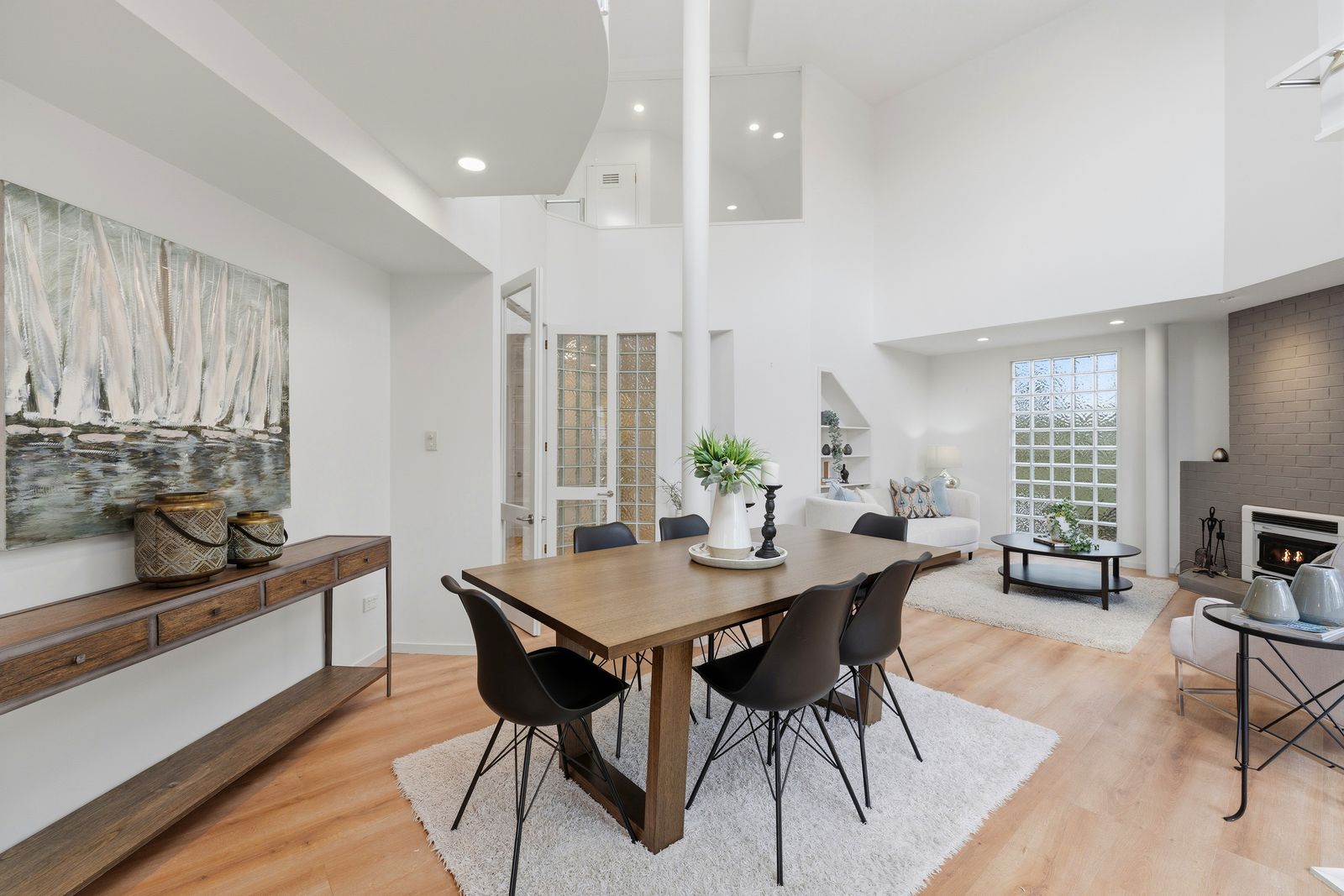 Otakau Road, Milford - dining room styled beneath the atrium