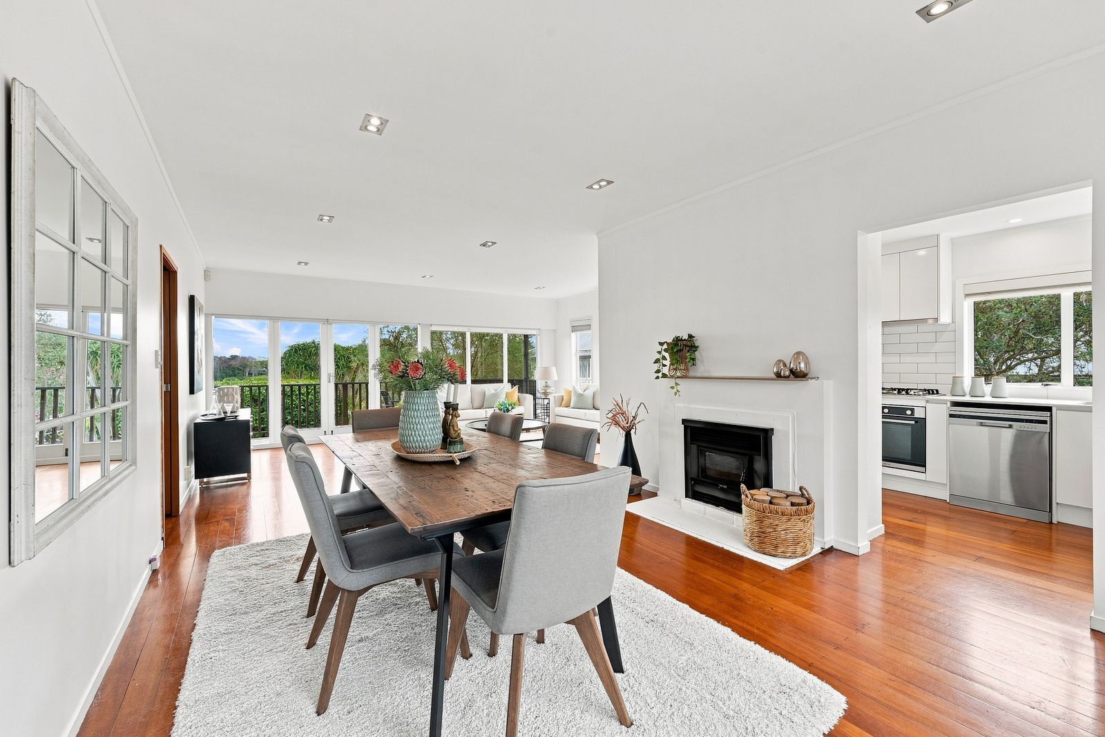 Hurstmere Road, Takapuna - dining room styled beside the fireplace