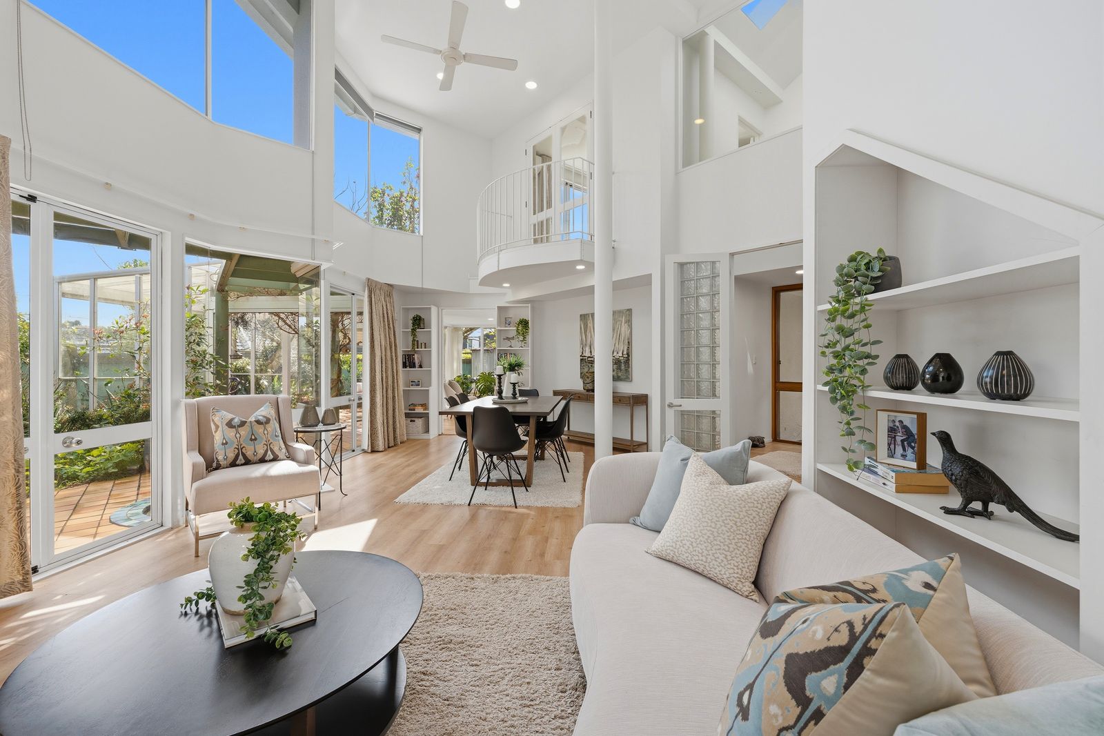 Otakau Road, Milford - double-height living room styled for entertaining