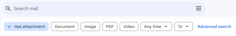 A screenshot of the Gmail search bar with the built-in search "chips" below the search bar that appears when you simply put your cursor in the search box. In this case, the "Has attachment" search "chips" was selected