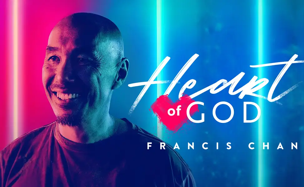Francis Chan smiling with colorful neon blue and pink background and Heart of God text.