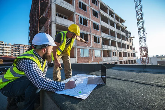 construction workers preparing for next stage of building