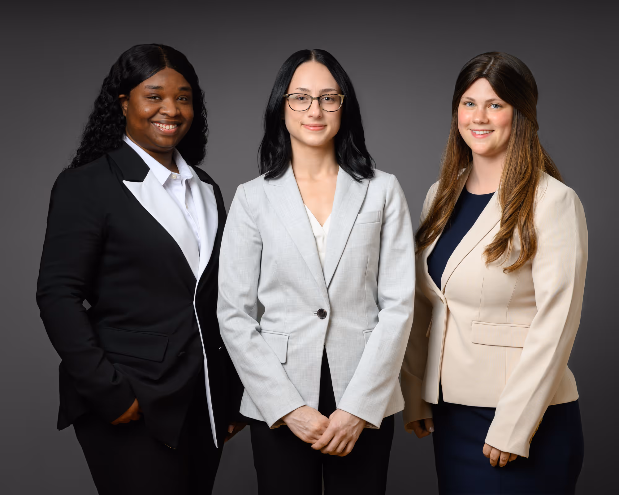 Executive Assistant Clayreesa Barnes with attorneys Maria Romito and Shula Goldstein at the Law Offices of Brian J. Smith, ltd.