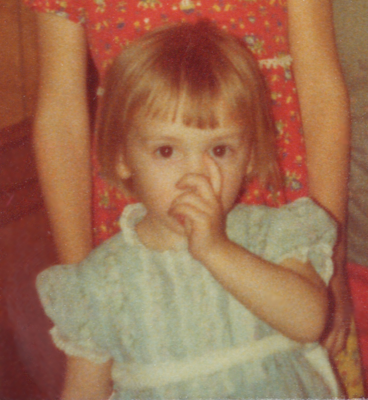 The author at the age of 2, sucking her thumb.