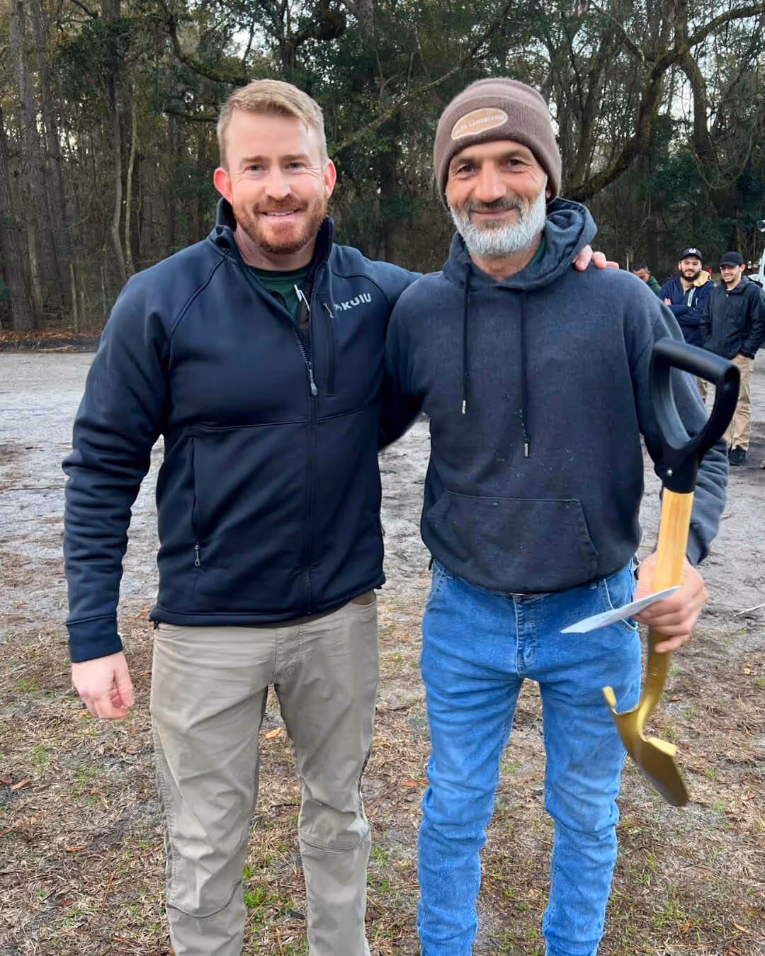 Landscape worker receiving award