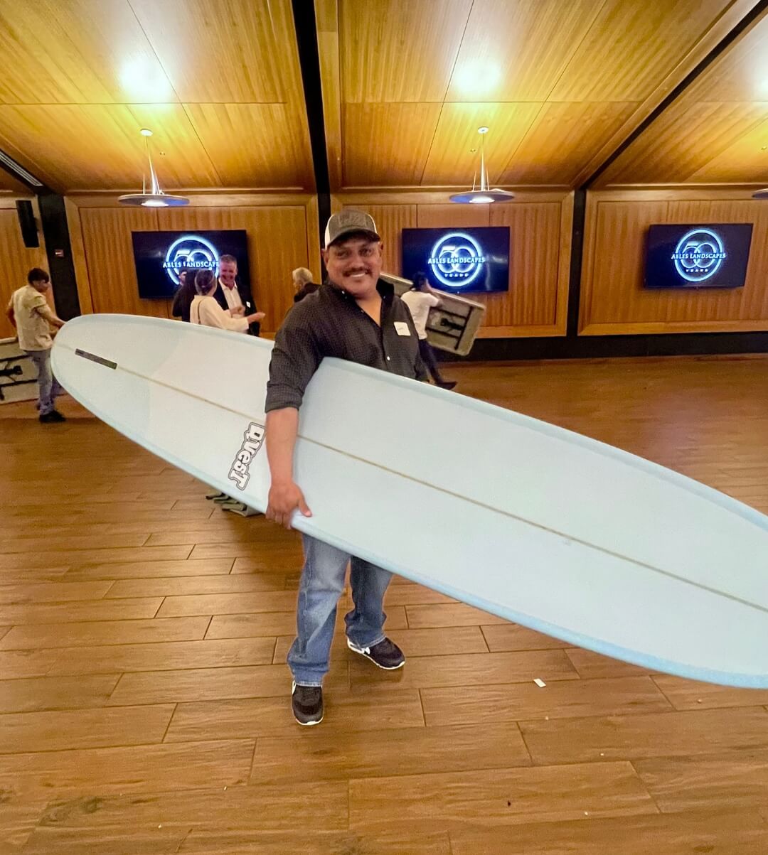 Team member wins gift at employee event