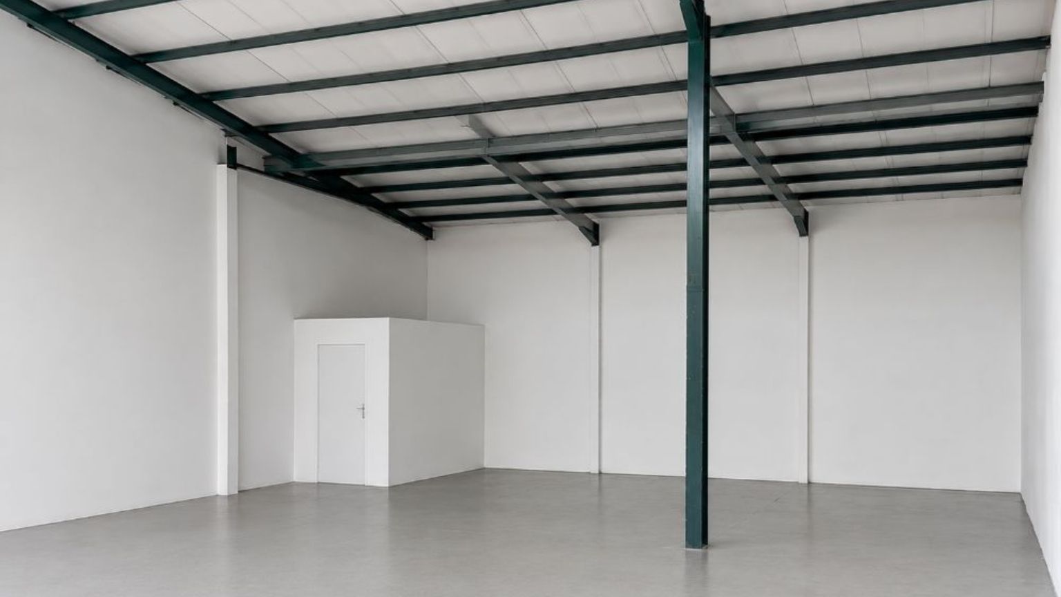 Secure warehouse with roller shutter door and truck access
