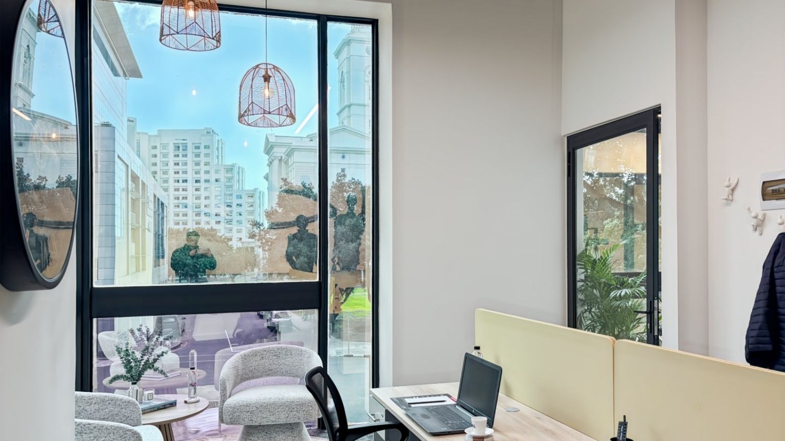 Corner loft office with high ceiling and city views