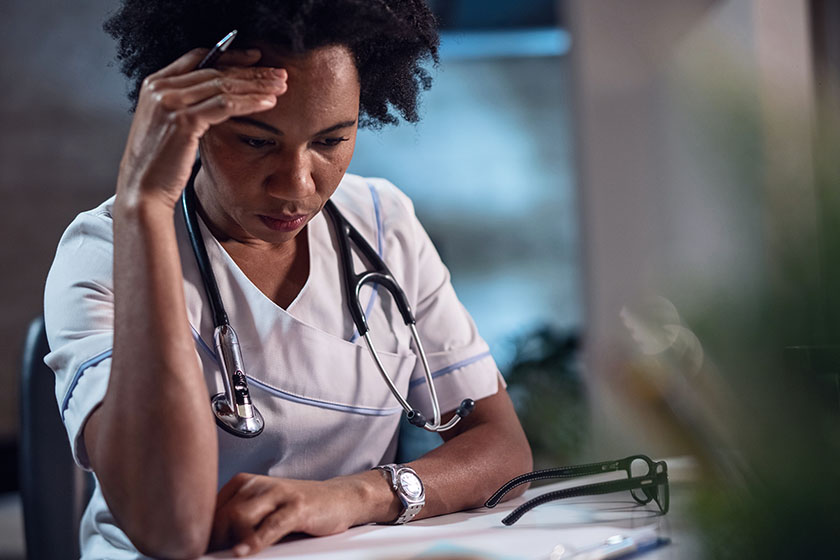 CareRev nurse showing resilience as she charts