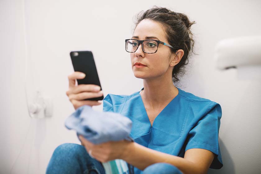 CareRev nurse picking up shift on phone 