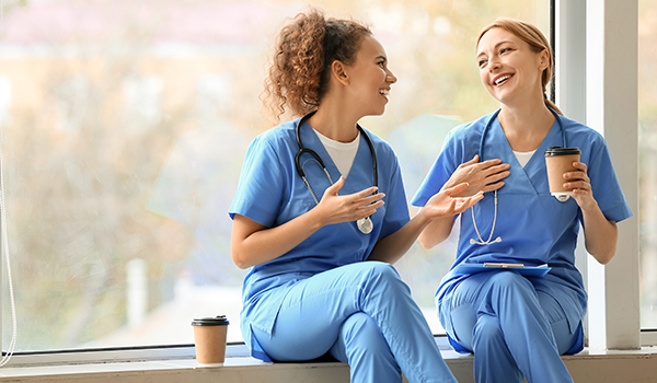 nurses laughing and chatting