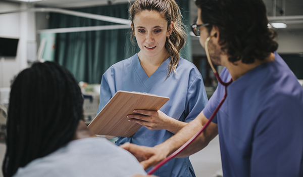 CareRev nurses assessing patient
