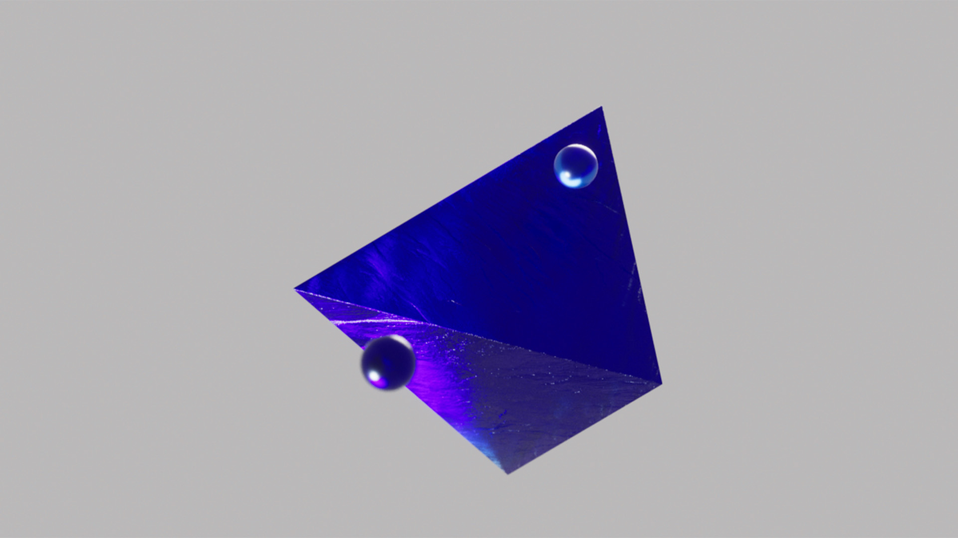 Floating spheres surrounding a pyramid in a crystal blue material in 3D for the Blauw Films Image Value Checker.