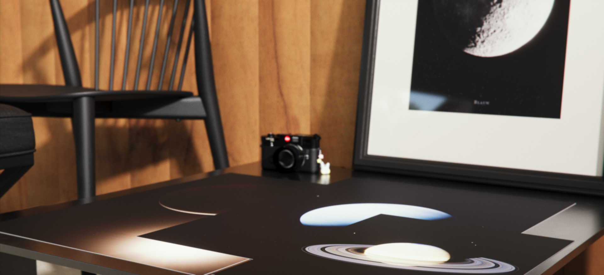 The best selling art prints from Blauw Films laid on a metal design table in a design wooden room.