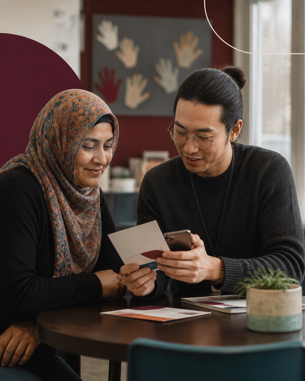 Volunteer coordinator helping a community member take the next step in Toronto