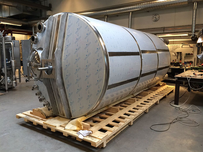 Large horizontal tank on a timber support