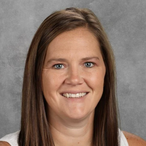 Woman with long straight hair smiling