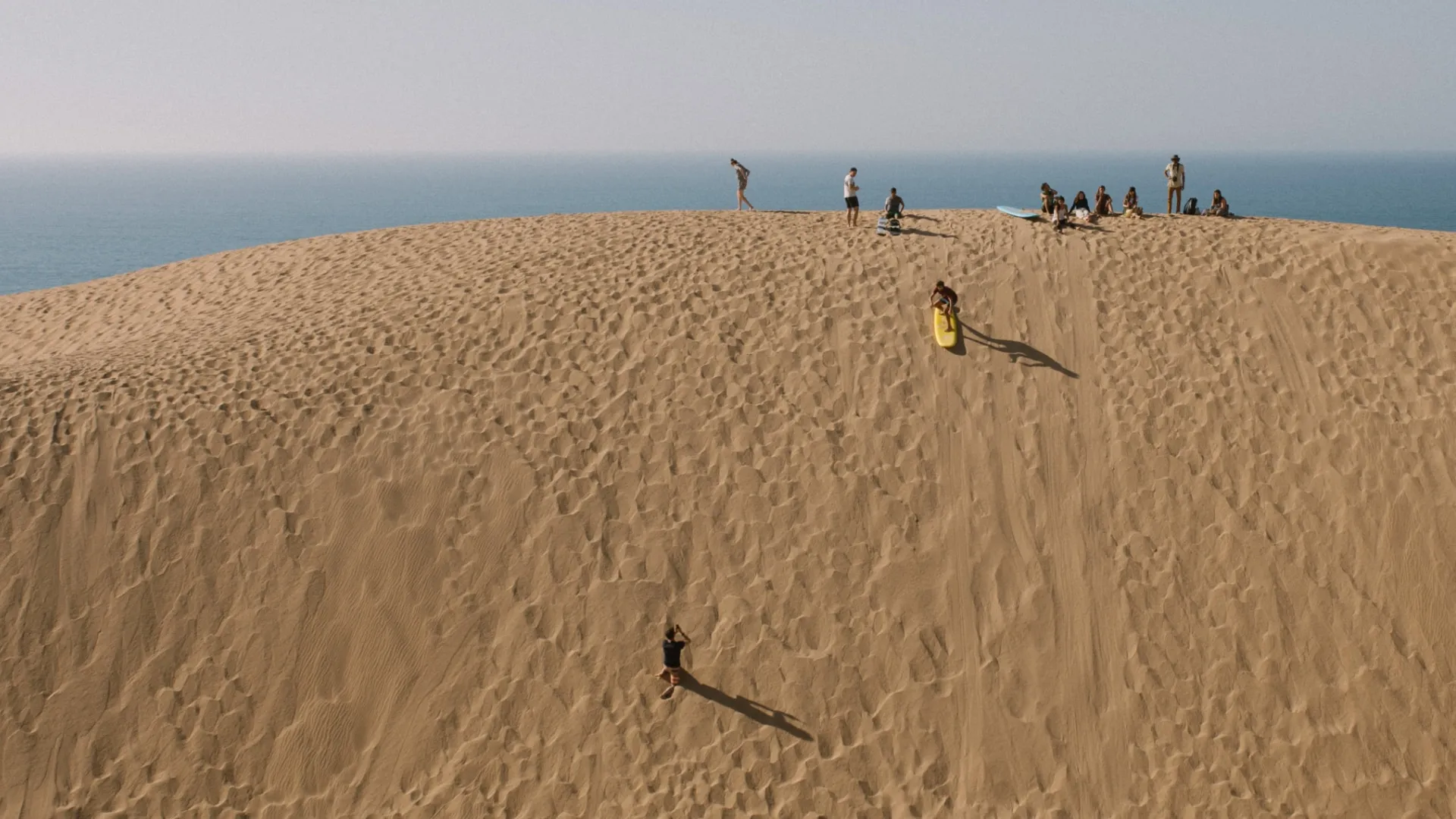 Sliding down the dunes
