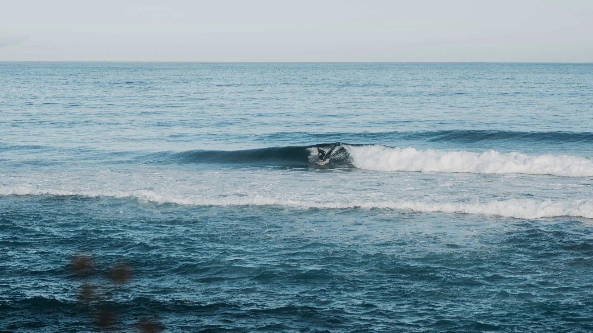 surfer on a fun clean wave
