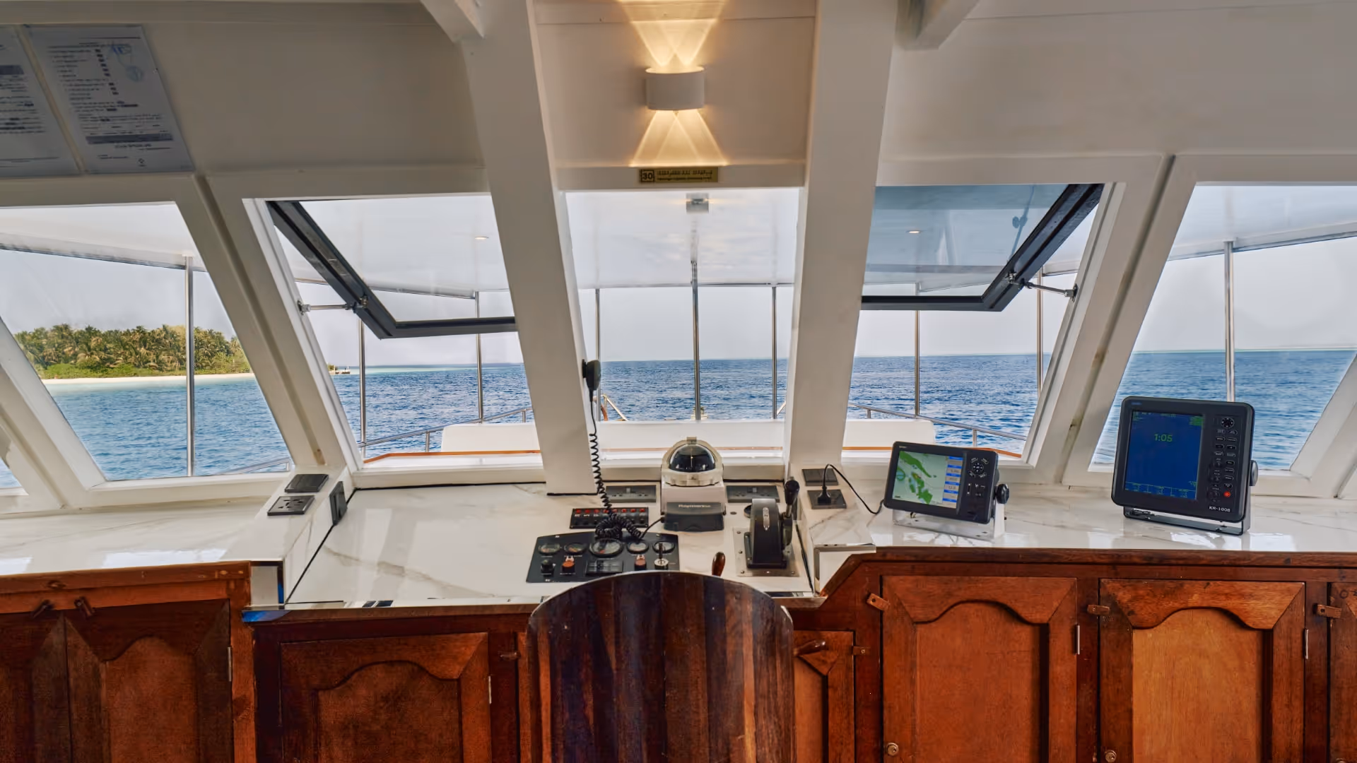 view of the captain control room on a maldivian boat
