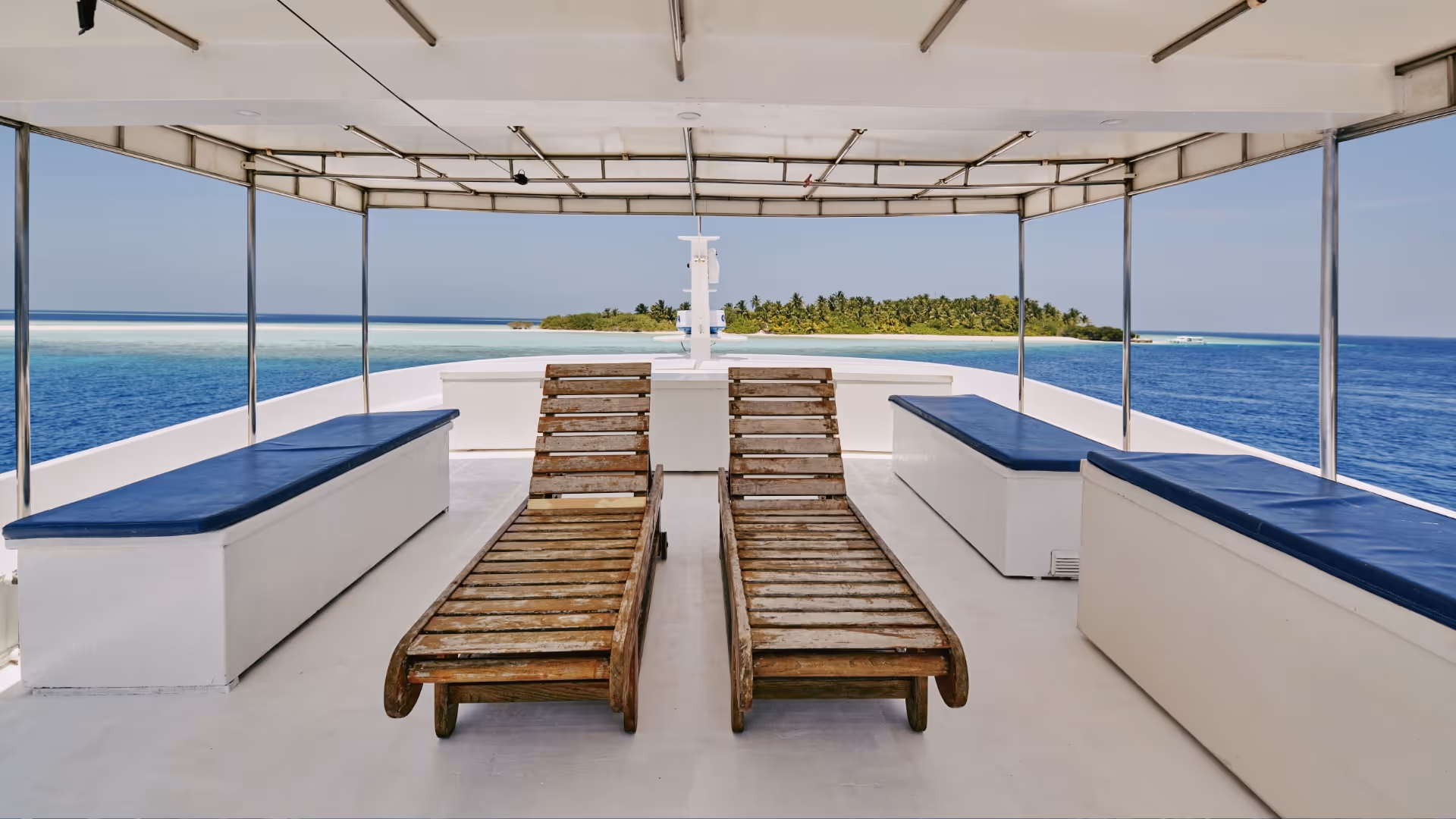 chairs on the top deck of maldivian boat