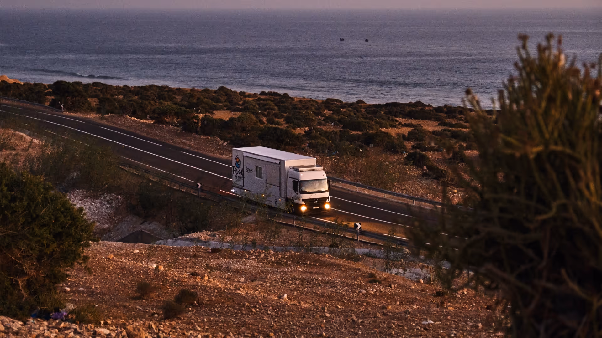 surf truck at sunset