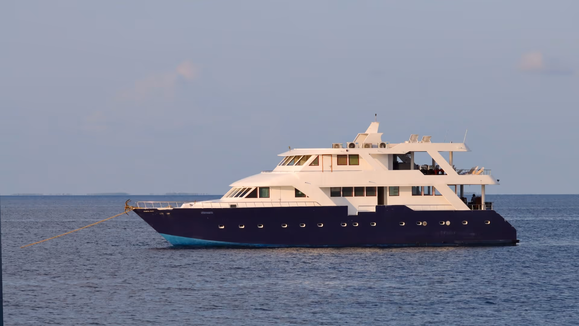 View of the boat with crew and guests, from the side