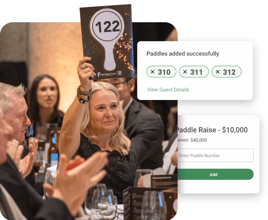 raising paddle during auction event