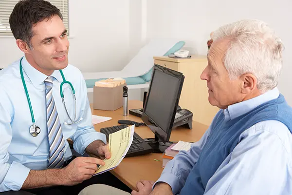 Man discusses BPH Treatment with his urology specialist