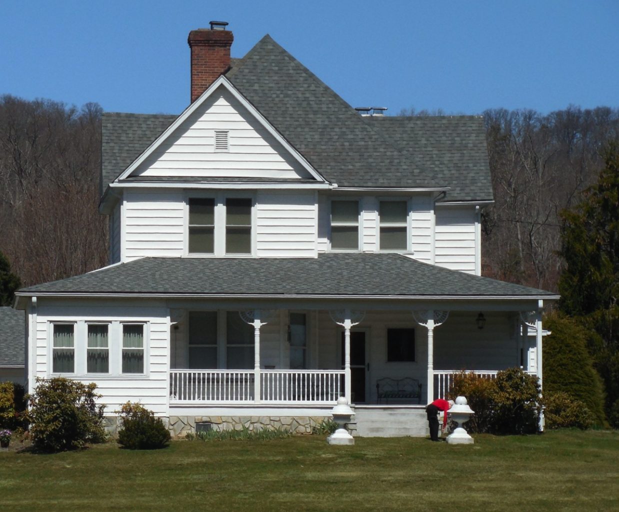 Front yard before a transformation with pastel flowers