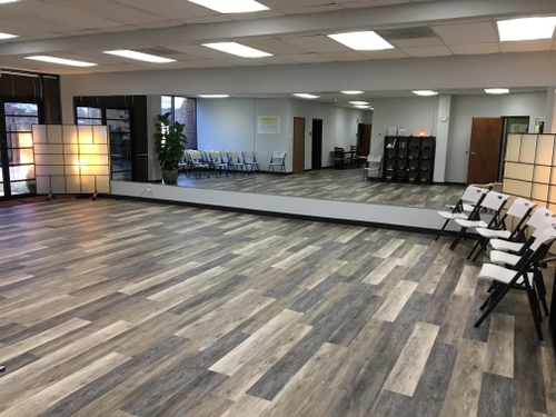 Main training floor, open layout with chairs around perimeter