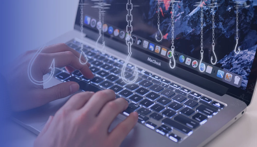 Image of hands typing on laptop