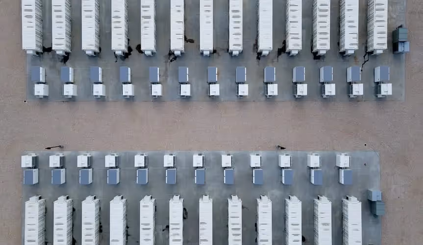 Overhead shot of rows of batteries outside.
