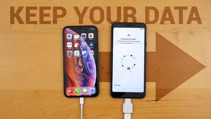 iphone xs and pixel 3a connected via a Lightning cable and a USB-C to USB adapter on a wooden desk