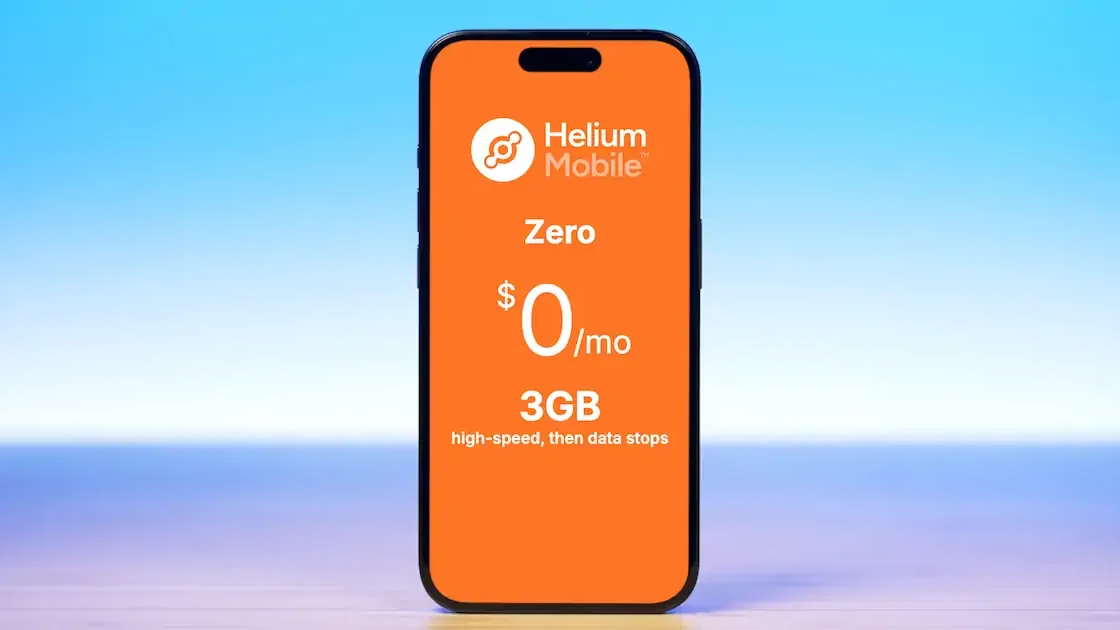 The phones standing vertically on a desk showing the Good2Go Mobile 1GB plan, US Mobile Unlimited Flex plan, and Visible Base plan on screen from left to right
