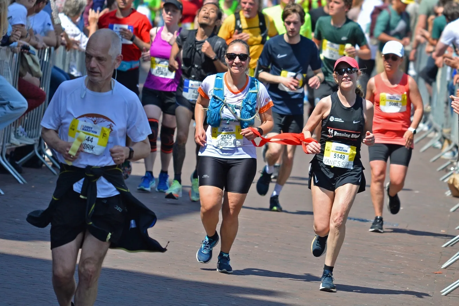 Vanessa running with her teammates at Running Blind in Leiden.