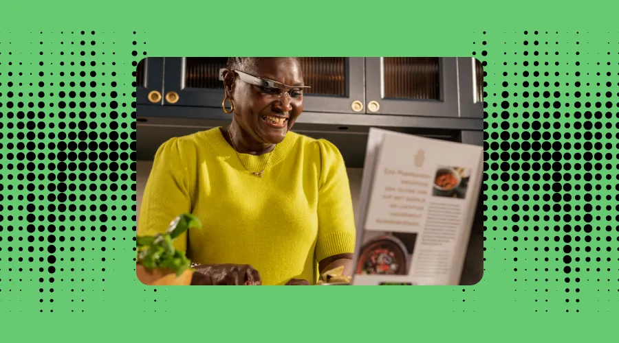 joy reading a recipe in her kitchen with the envsion glasses