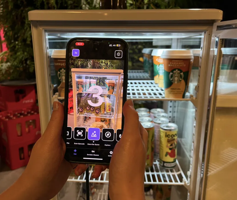 photo shows the 3-second timer on the describe scene feature on the envision pp which can be disabled or enabled based on your preference. the camera is pointed on a fridge filled with coffee, sodas and food