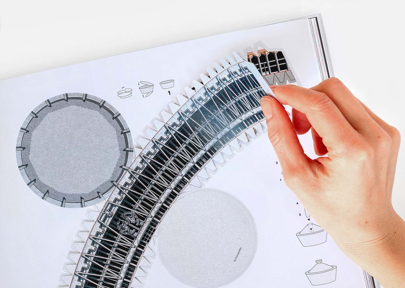Pulling out the paper model of Chișinău State Circus.