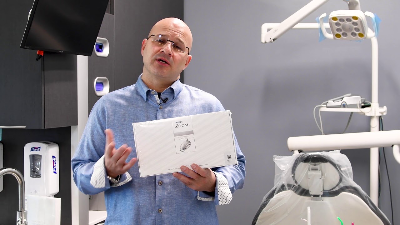 Dr. Abbiati describing the whitening specials at Island Paradise Dental.