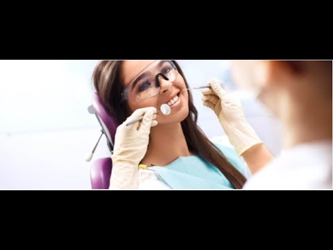 Dr. Abbiati holds floss 