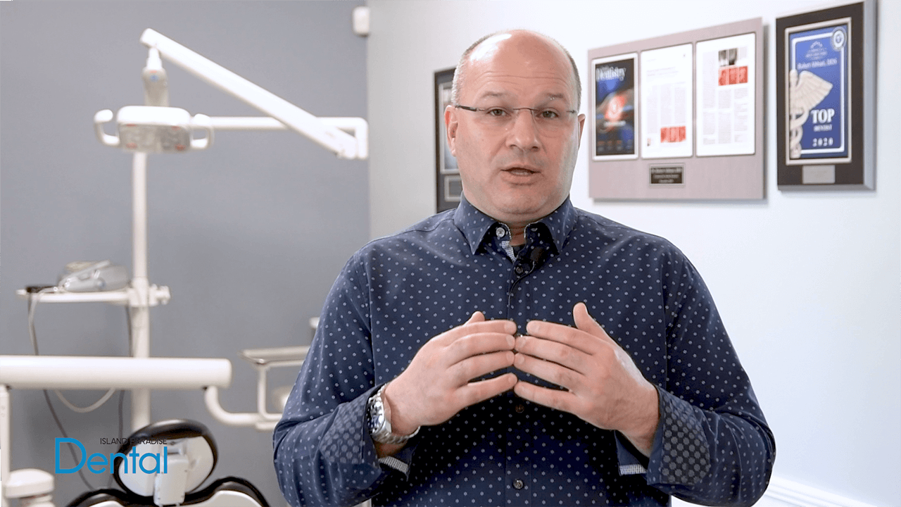 dentist discusses the differences between restorative and cosmetic dentistry in marco island